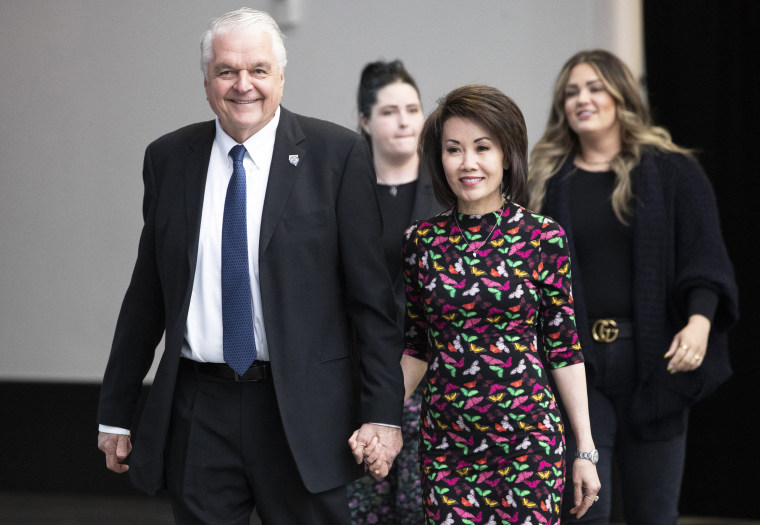 Nevada Gov. Steve Sisolak arrives with his wife Kathy to deliver the State of the State address in Las Vegas on Feb. 23, 2022.