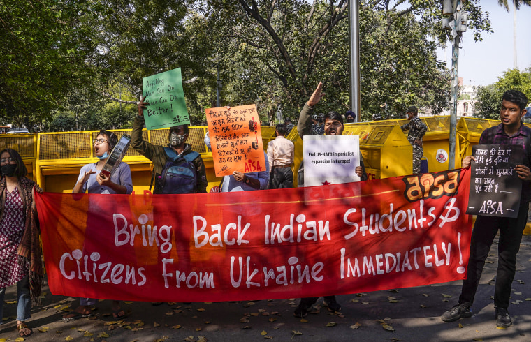 Image: Activist of All India Students' Association shout slogans during protest in New Delhi on March 2, 2022.