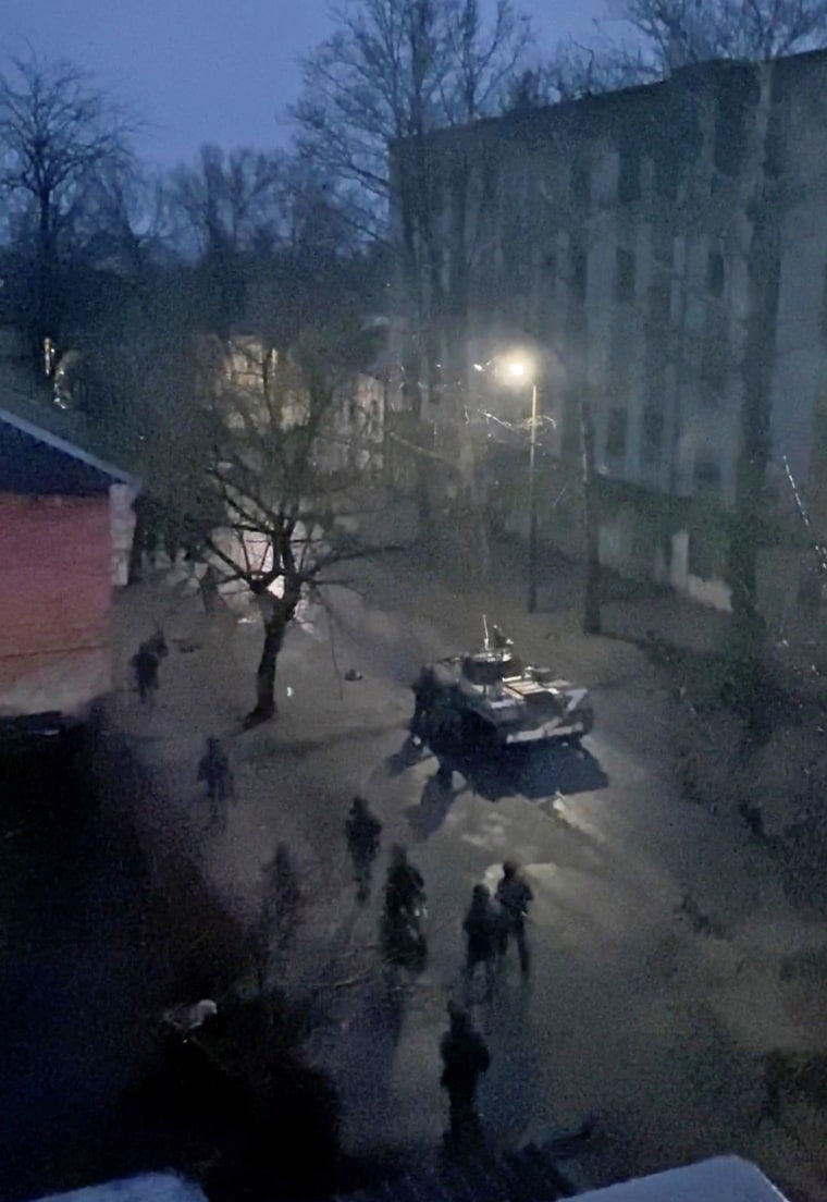 A military tank is seen on a street of Kherson