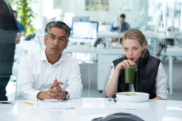 Naveen Andrews as Sunny Balwani and Amanda Seyfried as Elizabeth Holmes in “The Dropout" on Hulu.
