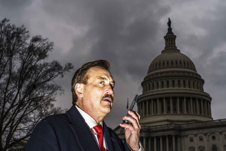 Image: My Pillow CEO Mike Lindell on his phone before addressing the crowd in front of the Capitol on Jan. 5, 2021.