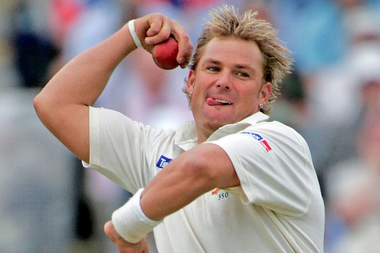 Image: FILE PHOTO: Australia's Warne bowls to England's Hoggard during the second Ashes test in Birmingham.