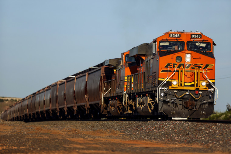 A Burlington Northern Santa Fe Railway Co. grain train heads west on the railroad's Southern Transcontinental line in Belva, Okla., on Aug. 19, 2015.