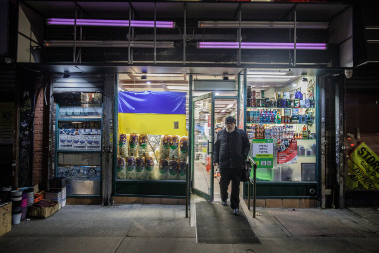 The grocery store Taste of Russia took down its sign and placed a Ukrainian flag in the window.