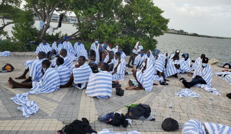 Multiple agencies responded to a call of a wooden vessel carrying more than 300 Haitian migrants in the shallow waters off Ocean Reef Club in north Key Largo on March 6, 2022, according to the U.S. Border Patrol.