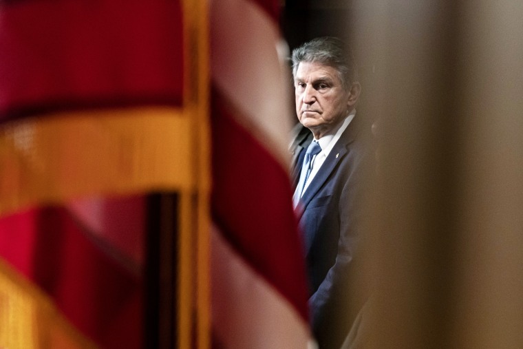Sen. Joe Manchin, D-W.Va., attends a news conference about a bill to ban Russian energy imports on March 3, 2022, on Capitol Hill.