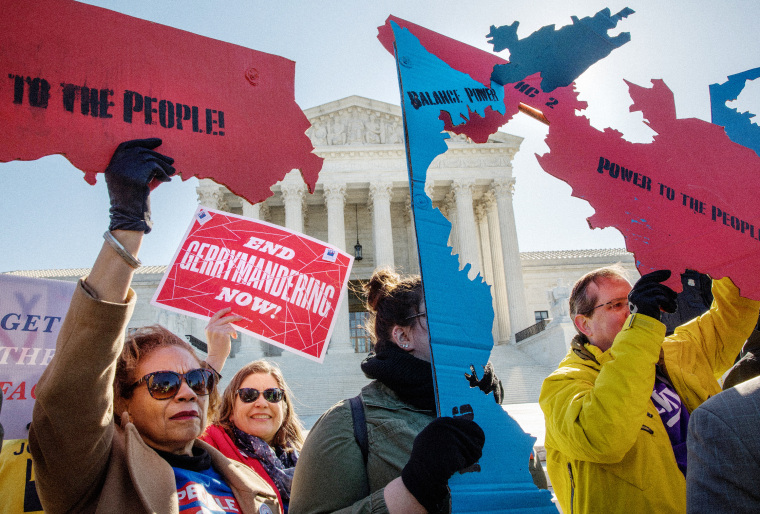 Demonstrators protest against gerrymandering at a rally at the Supreme Court during the gerrymandering cases Lamone v. Benisek and Rucho v. Common Cause on March 26, 2019.