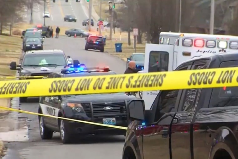 Police investigate a fatal shooting in Joplin, Missouri, on Tuesday.