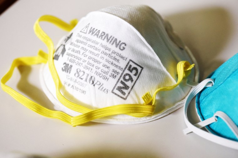 Image: FILE PHOTO: Various N95 masks at a laboratory of 3M in Maplewood, Minnesota