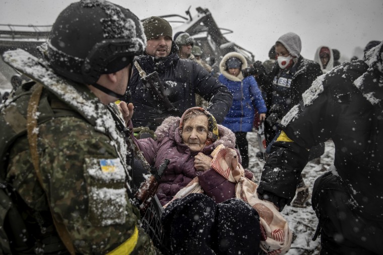 Civilians fleeing from Irpin, near Kyiv