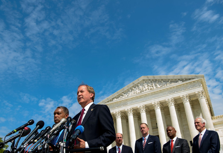 Image: Texas Attorney General Ken Paxton outside of the Supreme Court in 2019.