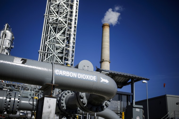 A pipe installed as part of the Petra Nova Carbon Capture Project carries carbon dioxide captured from the emissions of the NRG Energy Inc. WA Parish generating station in Thompsons, Texas, on Feb. 16, 2017.