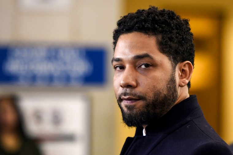 Jussie Smollett talks before leaving Cook County Court in Chicago on March 26, 2019.