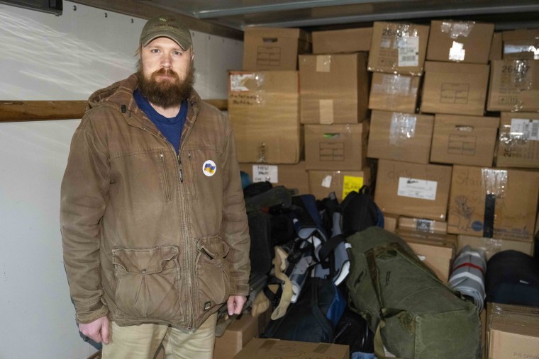Jonathan Pylypiv inside a truck loaded with medical and relief items to be sent to Ukraine at St. Matthew Orthodox Church on March 10, 2022 in Green Bay, Wisc.