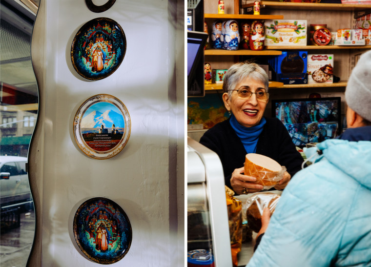 Plates depicting Russian fairy tale scenes at the store; Marina Begiv shows a customer ham for purchase.