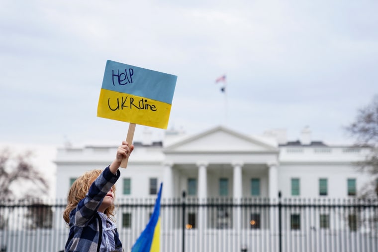 Image: Peace activists protest against Russia's war in Ukraine during "Stand with Ukraine" rally outside the White House