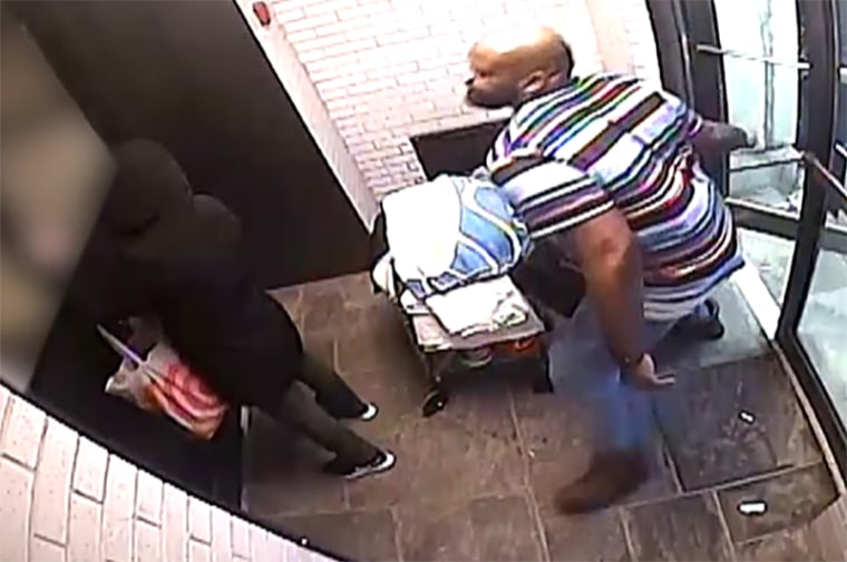 An image from a security camera shows a man about to attack an Asian woman in the lobby of a building in Yonkers, N.Y.