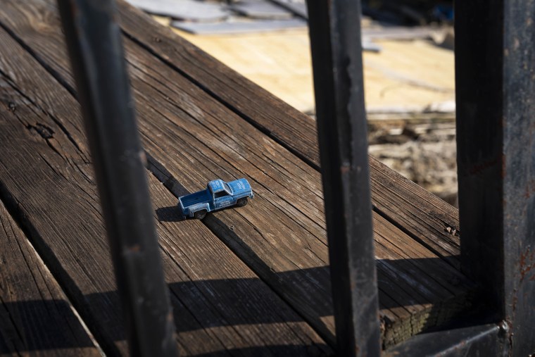 Debris is still scattered across the site of the former Arizaga family home.