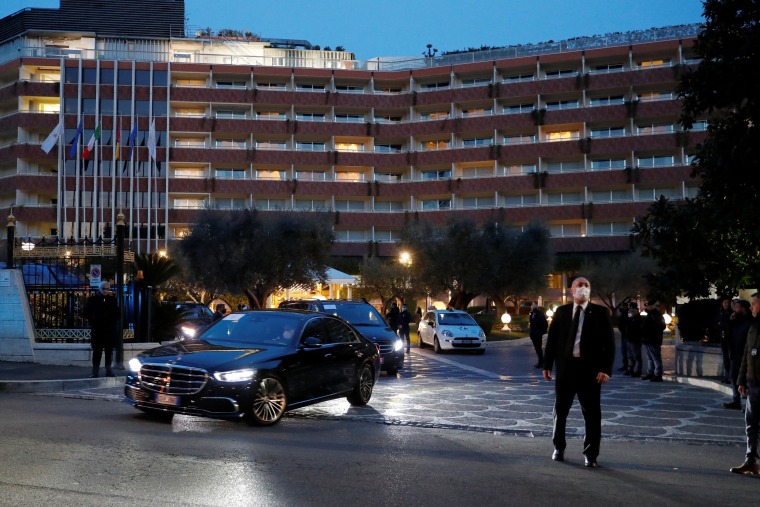 Image: Members of the Chinese delegation leave the Rome Cavalieri a Waldorf Astoria hotel, in Rome