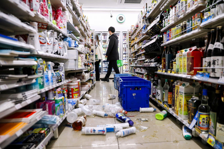 Scattered goods caused by an earthquake are seen at a convenience store in Sendai, Miyagi prefecture, Japan on March 17, 2022.