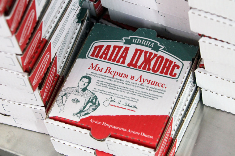 Empty pizza boxes on a counter at a Papa John's in Moscow on Aug. 16, 2011.
