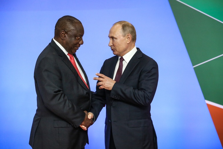 Russian President Vladimir Putin greets South African President Cyril Ramaphosa during the welcoming ceremony at the Russia-Africa Summit in Black Sea resort of Sochi, Russia, Oct. 23, 2019.