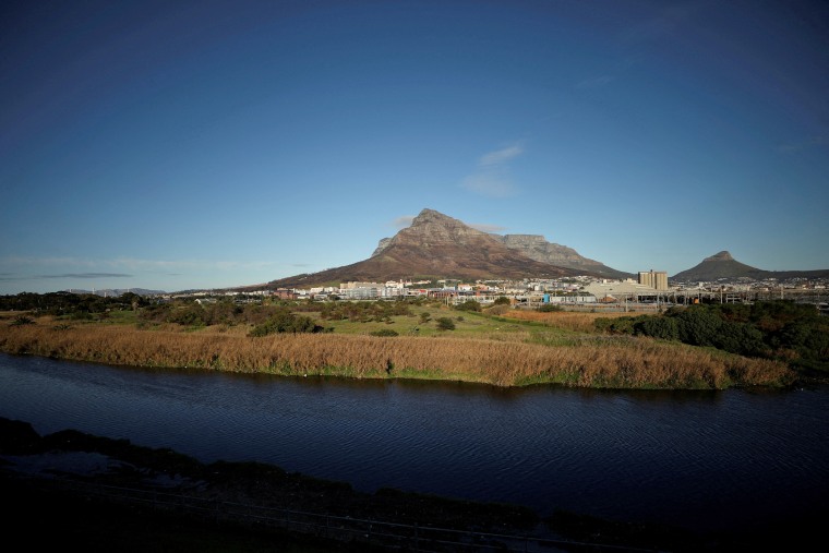 FILE PHOTO: Contested land earmarked for a development which includes a new Africa headquarters for U.S. retail giant Amazon is seen alongside the Black River in Cape Town