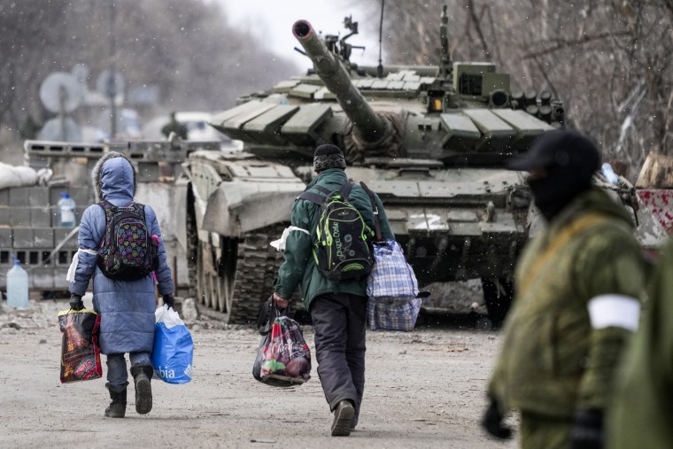 Civilians trapped in Mariupol, Ukraine, are evacuated in groups under the control of pro-Russian separatists on March 20, 2022.