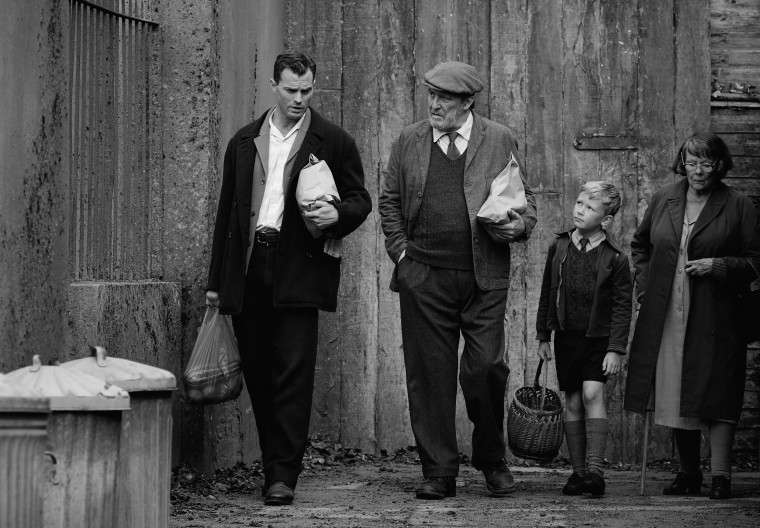 Jamie Dornan as "Pa", Ciarán Hinds as "Pop", Jude Hill as "Buddy", and Judi Dench as "Granny" in "Belfast."