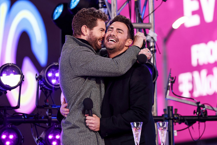 Jaymes Vaughan, left, and Jonathan Bennett speak during the Times Square New Year's Eve Celebration on Dec. 31, 2021, in New York.