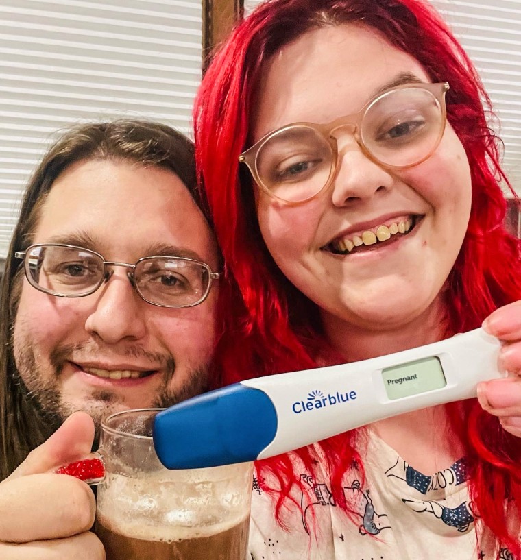 Leah and Stephen Russell celebrate their positive pregnancy test on Dec. 20, days before they were able to share the news with their families.
