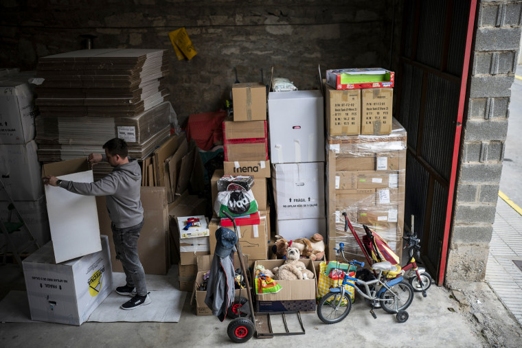 A volunteer organizes donations to be sent to Ukraine in the village of Guissona, Lleida, Spain, on March 17, 2022.