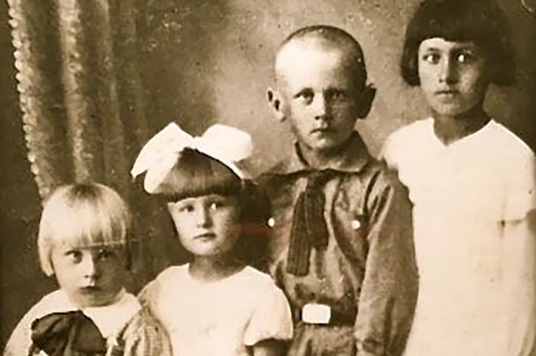 Dennis Wypijewski, left, with his siblings before he was deported as a child from Ukraine to Russia.