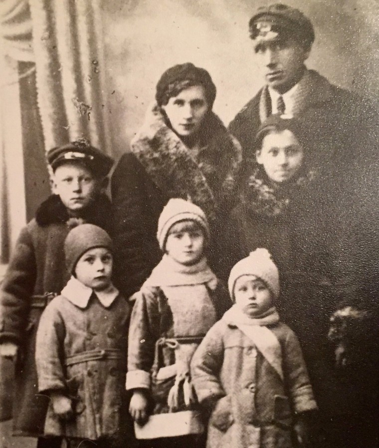 Dennis Wypijewski, lower left, with his family before being deported from Ukraine to Russia.