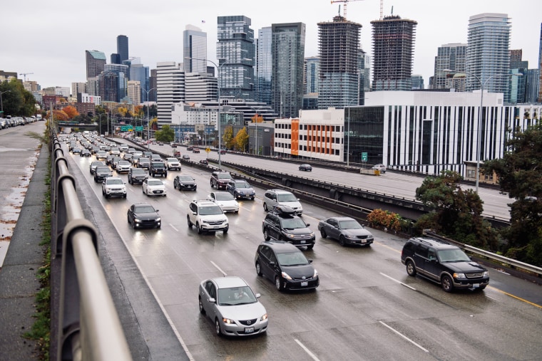 Vehicles travel on northbound Interstate 5 in Seattle