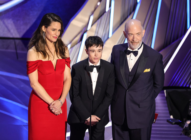 Jennifer Garner, Elliot Page, and J.K. Simmons speak onstage during the Academy Awards in Los Angeles on Sunday.