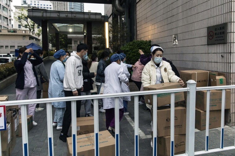 Shanghai Locks Down Half the City to Nail Growing Covid Outbreak