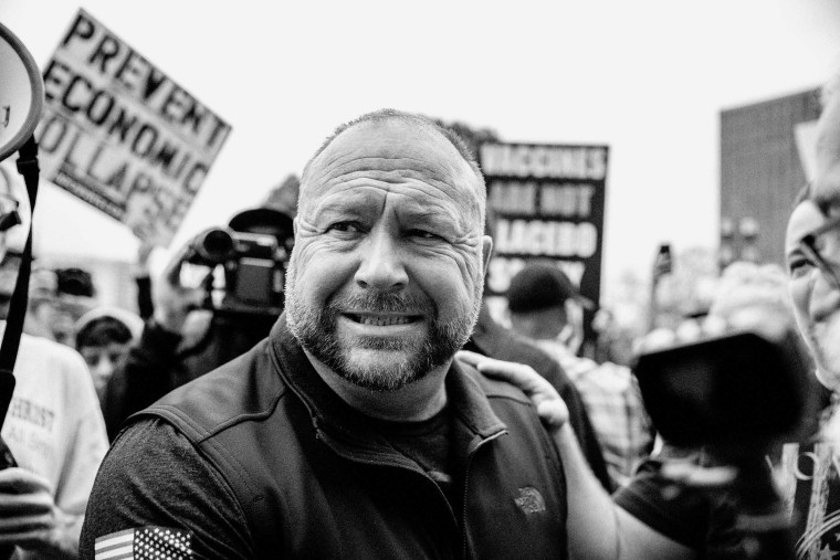 Infowars founder Alex Jones interacts with supporters at the Texas State Capital building on April 18, 2020 in Austin, Tex.