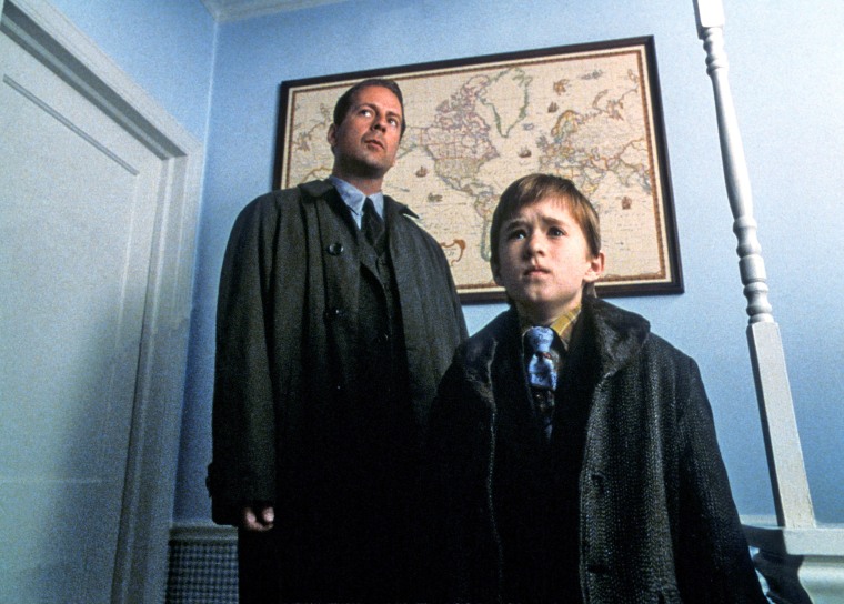 Bruce Willis and Haley Joel Osment in "The Sixth Sense," from 1999. 
