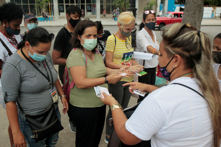 Activists for LGBT rights campaign on the street in Havana