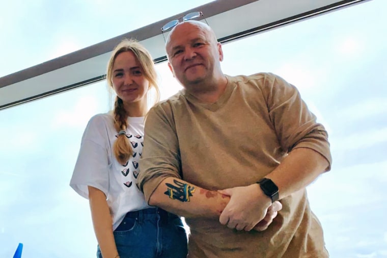 Anastasiia Moskalenko and Ihor Solomko reunite at San Diego International Airport on Thursday.