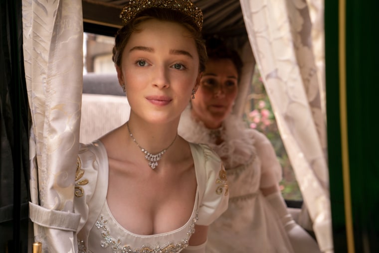 Phoebe Dynevor as Daphne Bridgerton and Ruth Gemmell as Lady Violet Bridgerton in "Bridgerton."