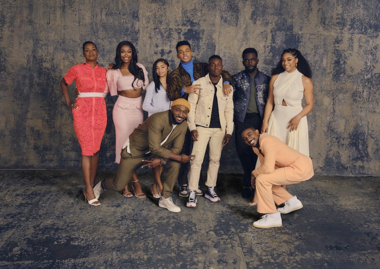 The cast of the new Peacock series "Bel-Air" from left to right. Cassandra Freeman, Coco Jones, Akira Akbar, Adrian Holmes (kneeling), Jabari Banks, Olly Sholotan, Jimmy Akingbola, Jordan L. Jones (kneeling), and Simone Joy Jones.