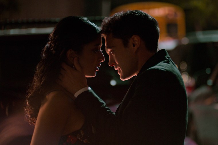 Devi and Paxton's dance in the season 2 finale. NEVER HAVE I EVER (L to R) Maitreyi Ramakrishnan as Devi Vishwakumar and Darren Barnet as Paxton Hall-Yoshida in Never Have I Ever. Courtesy of Netflix © 2021