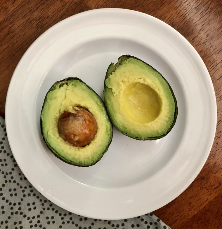  A previously frozen avocado falls open like a dream.