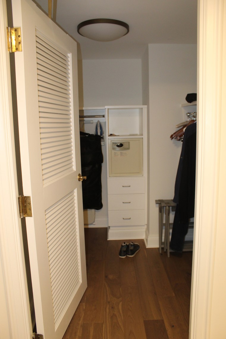 A photo of the closet in Saget's hotel room showed clothes on hangers and shoes on the floor.