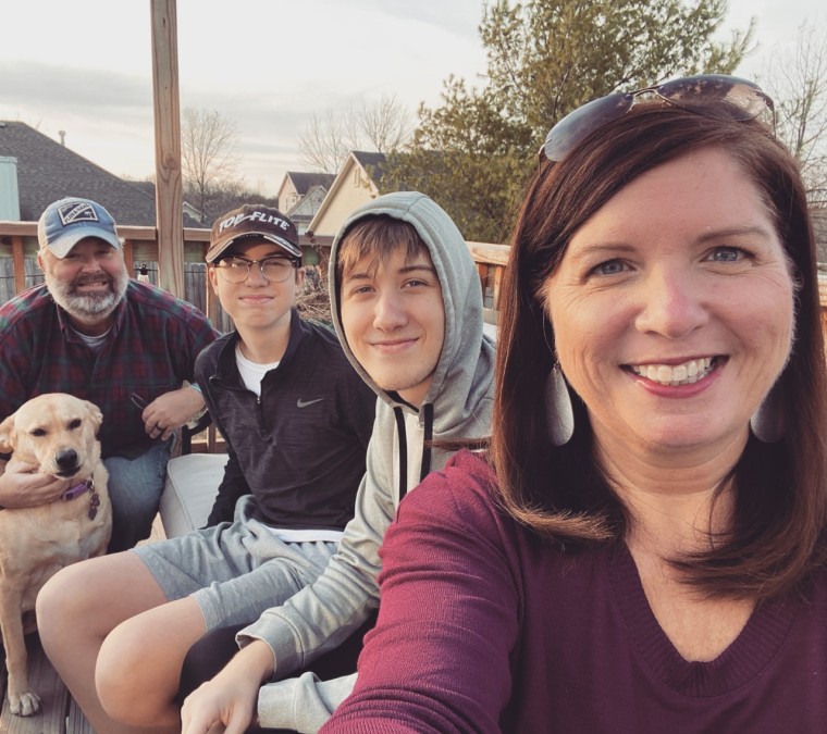 Devlin shares a happy moment with her sons Sean and Conor, her husband, Brandon, and Lulu the dog. 