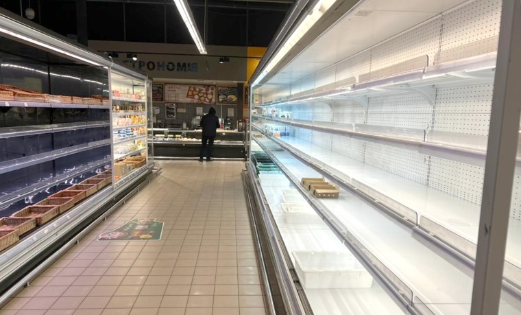 Empty shelves at a supermarket in Kyiv. 
