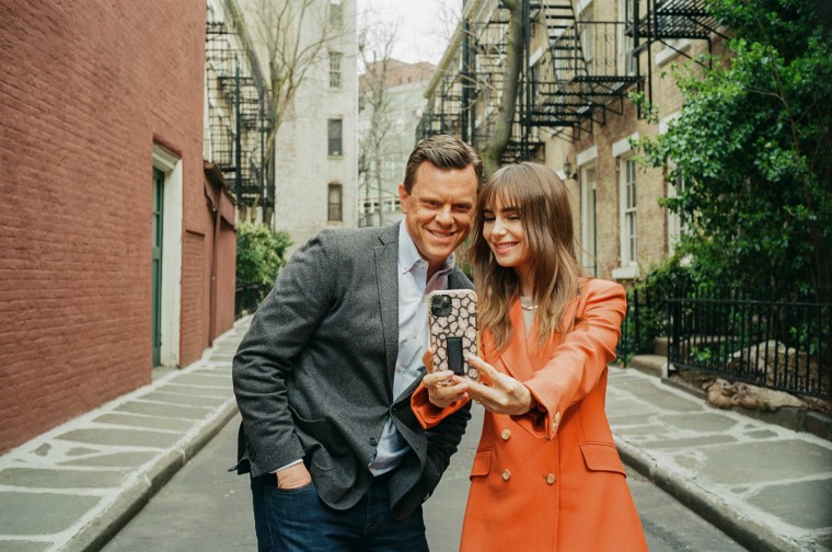 Willie Geist and Lily Collins pose for a selfie.