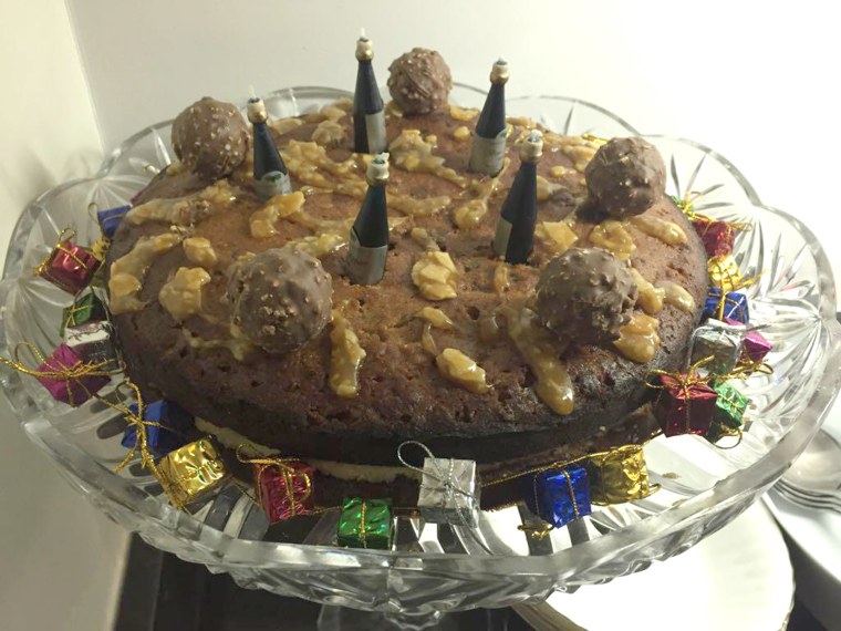 Oh, dear. I remember being proud of this cake when I made it. It was for my mum's birthday. That stuff on the top was supposed to be salted caramel sauce, but ended up being shards of crystallized caramel. And if you can't tell by the black edges of the cake, it was a little bit overbaked. The Ferrero Rochers tasted amazing, though!
